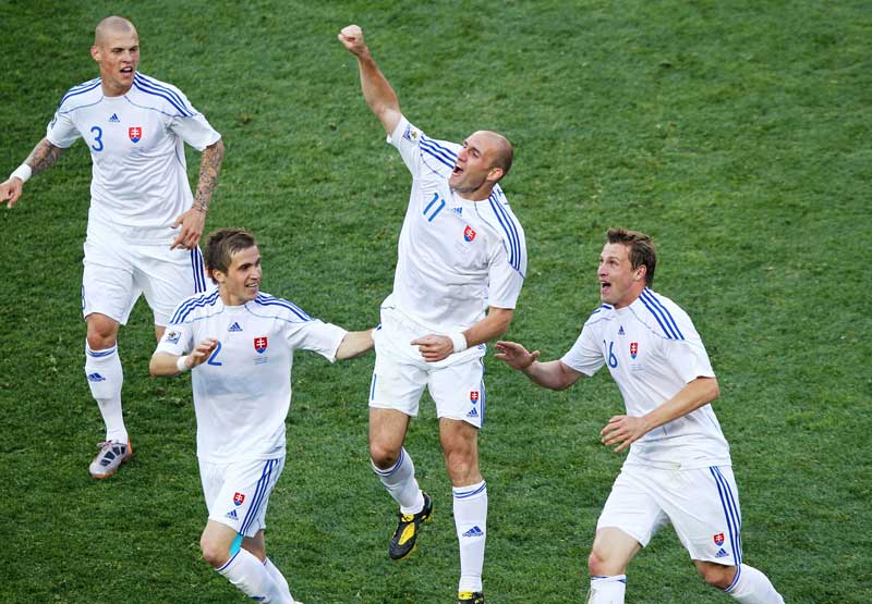 Robert Vittek celebrates scoring against Italy.